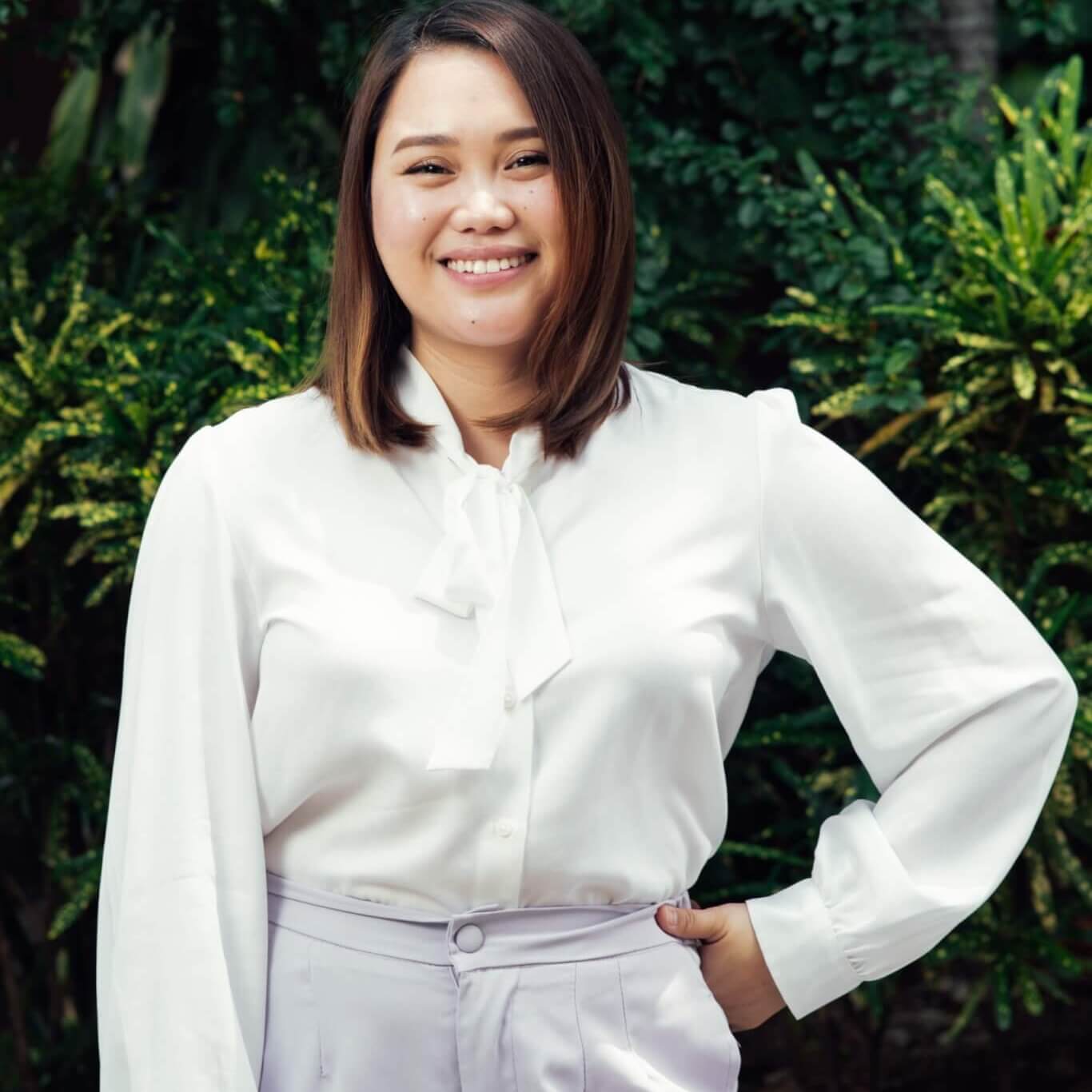Mica Alanzado, Psychologist based in Cebu City, smiling warmly and looking approachable, representing compassionate mental health care.